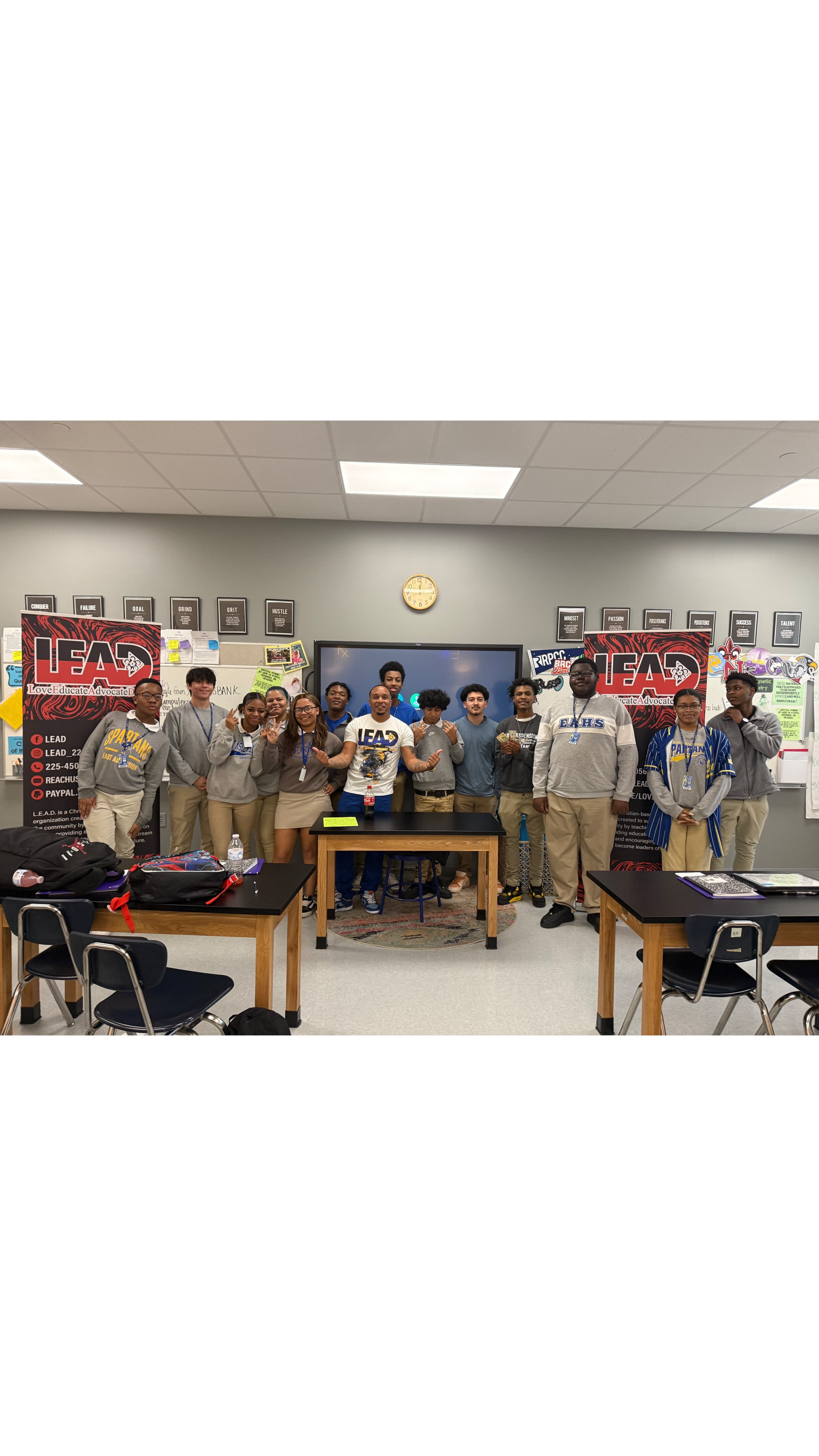 LEAD mentor with group of students in classroom